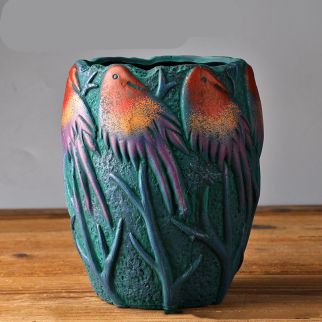 إناء للزهور على شكل طائر