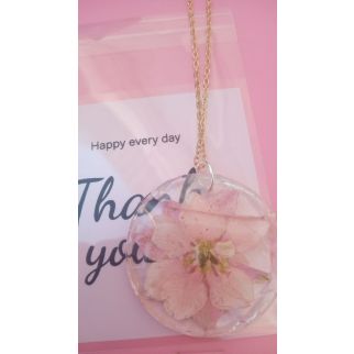 Circular Necklace with Pink Flowers.