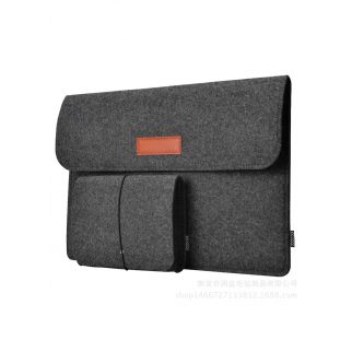 14-inch laptop bag in dark grey provides sleek and durable protection for your MacBook, combining style with functionality for convenient carrying and storage.