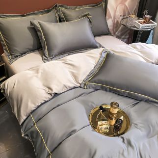 A set of 4 pieces of silk bedding, King size, providing warmth in winter and coolness in summer, and suitable skin protection coverage, equipped with a breathable duvet cover measuring 2.0 meters × 2.2 meters.