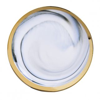 A marble plate with a diameter of 10 inches and edges coated in gold.