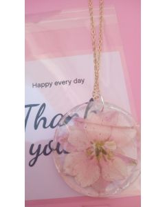 Circular Necklace with Pink Flowers.